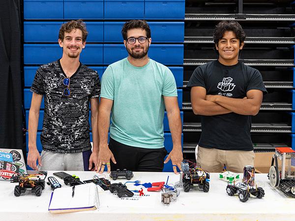 Members of the Robotics Innovation club tabling at a student involvement fair